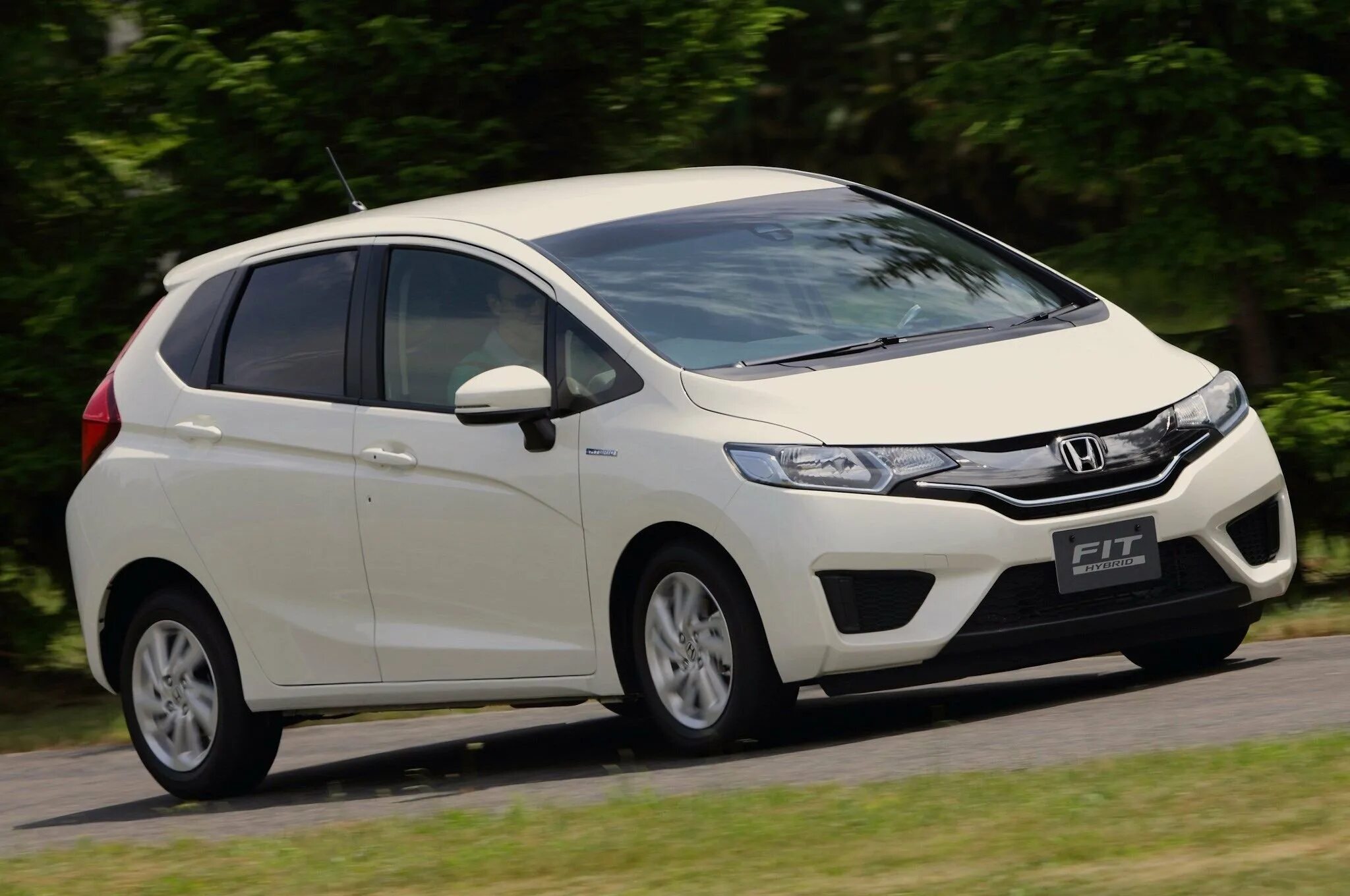 Хонда фит 2015 гибрид. Honda Fit Hybrid 3. Honda Fit Hybrid 2014. Honda Jazz 2014.