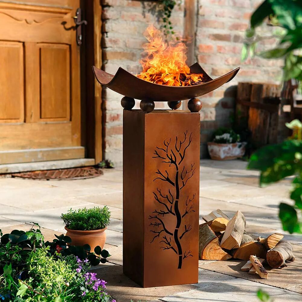 Уличный камин из металла. Садовый камин. Садовый камин jotul terrazza. Jotul froya. Уличный садовый камин.