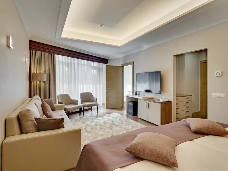 Junior suite номер в отеле. Джуниор сьют. Джуниор сюит это. Сюит в гостинице. Junior suite.