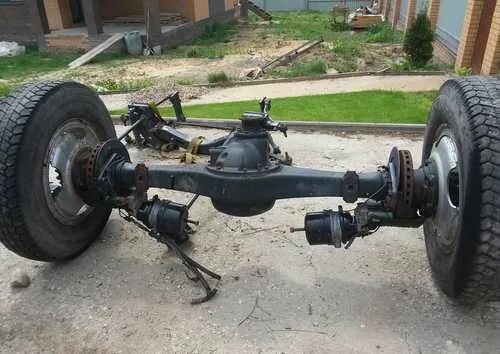 Газ 3308 задняя подвеска. Рама газон некст 10 тонн. Задний мост газон некст 10. Мост газон. Садко некст задний мост.