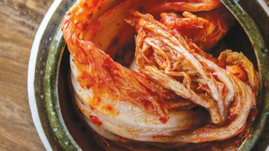 Рецепт кимчи из пекинской быстро. Пекинская капуста кимчи. корейская капуста кимчи. острая пекинская капуста кимчи. качан кимчи.