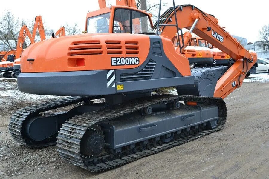 Гусеничный экскаватор umg e200c. Гусеничный экскаватор umg е400с. Caterpillar 319 dln. Колесный экскаватор jcb js 130w. Hyundai r180lc-9s.