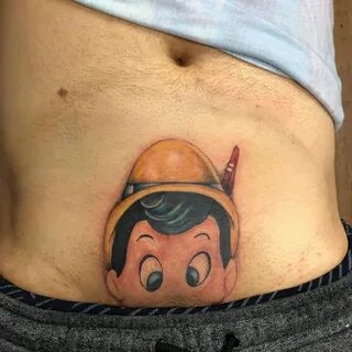 Pinocchio tattoo penis.