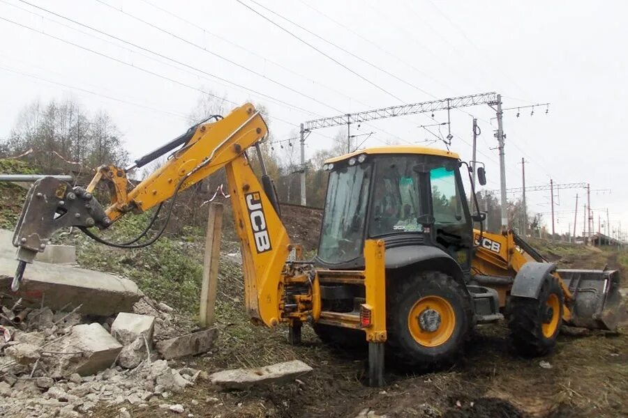 Вольво bl71b. Гидромолот вольво бл 71. Экскаватор jcb 3cx с гидромолотом. Экскаватор volvo bl71. Jcb 3cx k14m2nm.