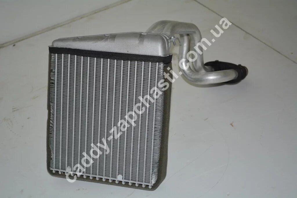 Фольксваген кадди радиатор печки. Радиатор отопителя кадди фольксваген. Радиатор отопителя кадди фольксваген. Радиатора печки vw caddy. Радиатора печки кедди.