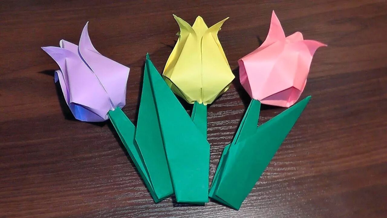 Оригами из бумаги цветочек тюльпан. Оригами из бумаги для детей цветы тюльпан. Оригами цветок тюльпан. Оригами тюльпан из бумаги.