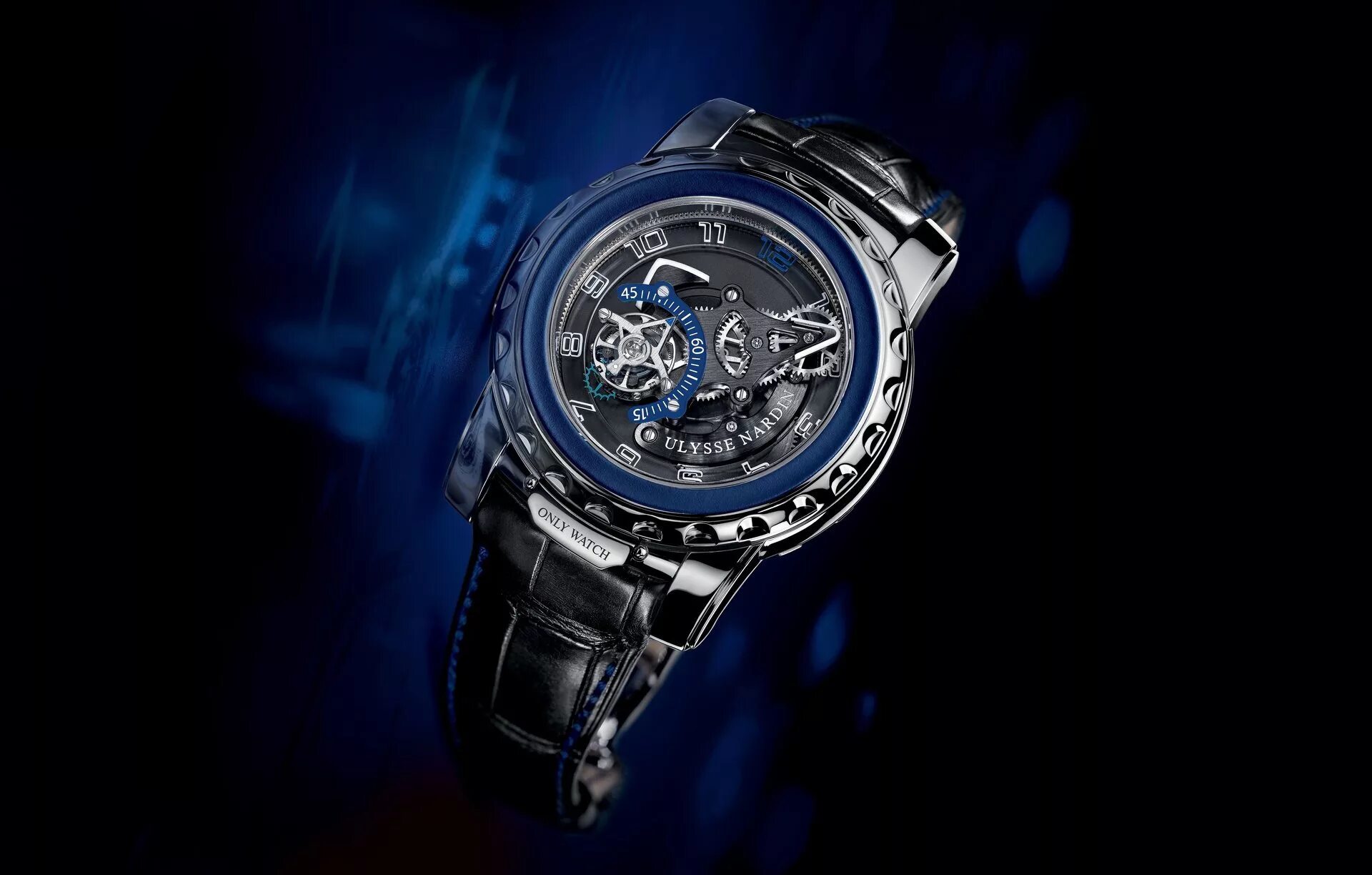 Фон наручные часы. Улисс Нордин Блю Фантом. Ulysse Nardin Blue Phantom. Ulysse Nardin Freak Blue Phantom. Часы Ulysse Nardin Freak.