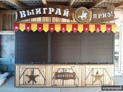 В парке аттракционов павильон для игровых автоматов