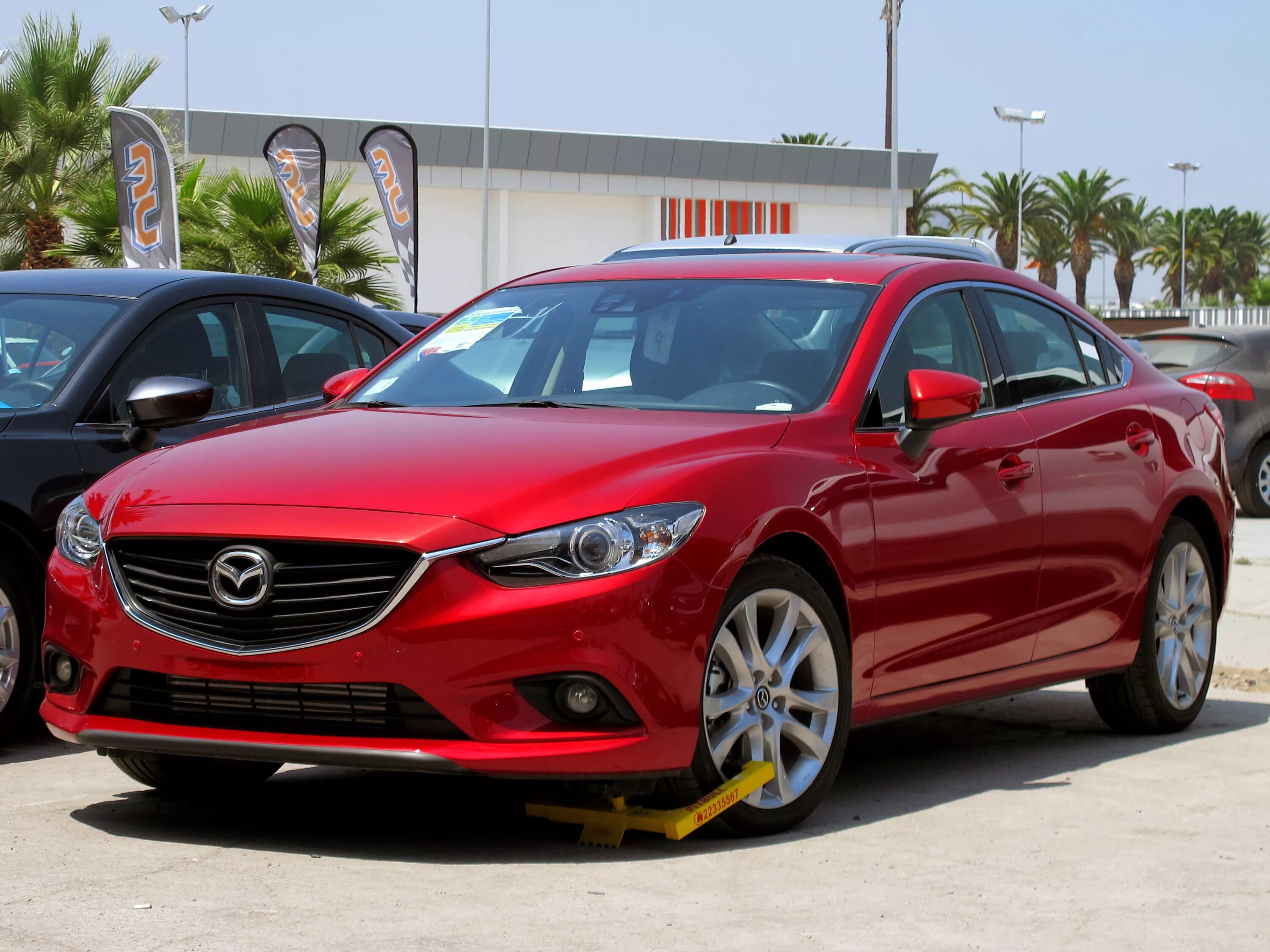 Mazda 16. Мазда 16 года. Мазда бизнес класса. Мазда 6 красного цвета.