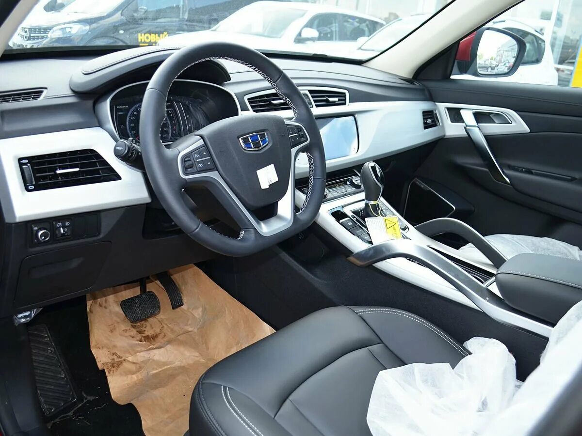 8 at. Geely atlas 2021. Geely atlas (1-е поколение). Geely atlas pro синий. Джили атлас 2022 салон.