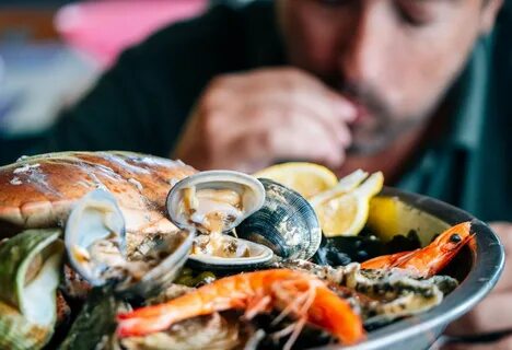 Man eats fish