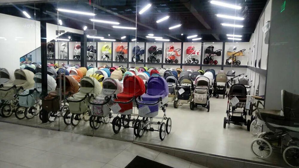 коляски для детей в магазине. самые дешевые магазины детской одежды. садовод детские коляски. магазин детских колясок. детские вещи рынок.