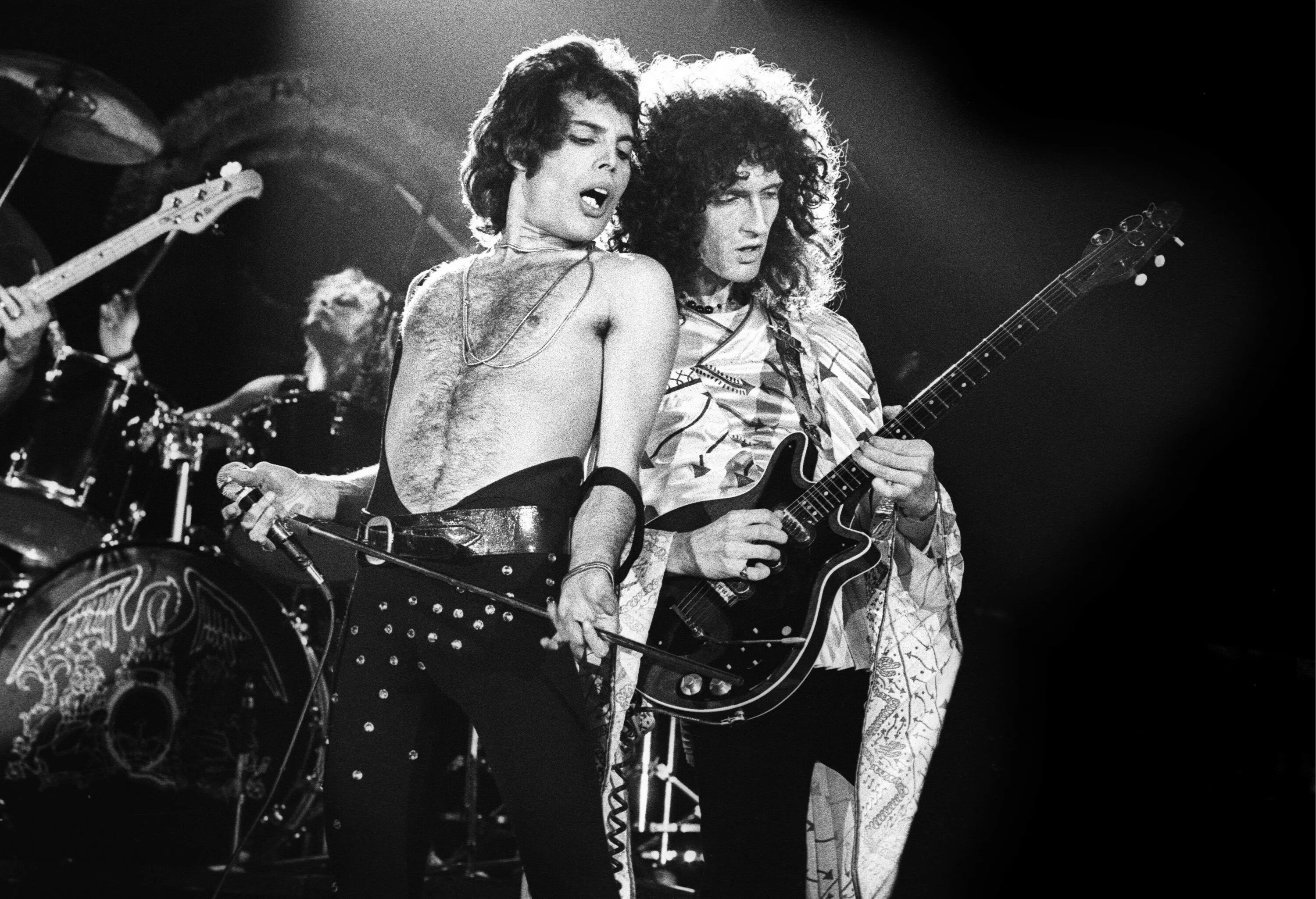 Группа Queen 70s. Брайан Мэй на концерте Queen. Группа Квин фото. Группа Queen Фредди Меркьюри.
