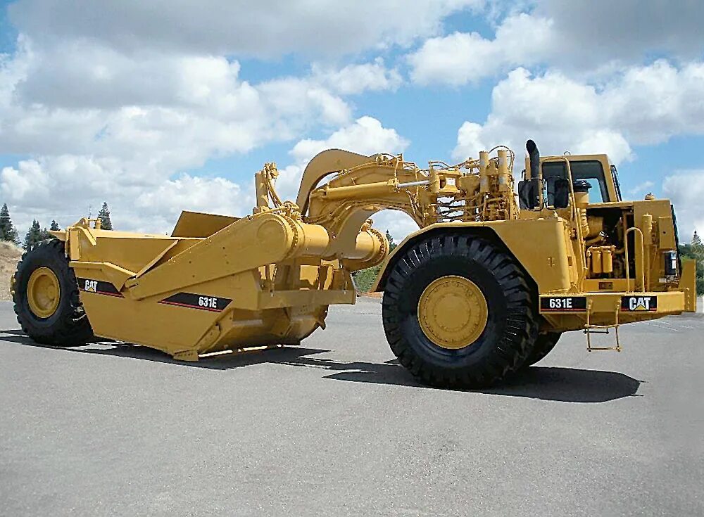 скрепер самоходный моаз-6014. колесный скрепер caterpillar 627h. скрепер. Caterpillar 623g. скрепер caterpillar ts225.