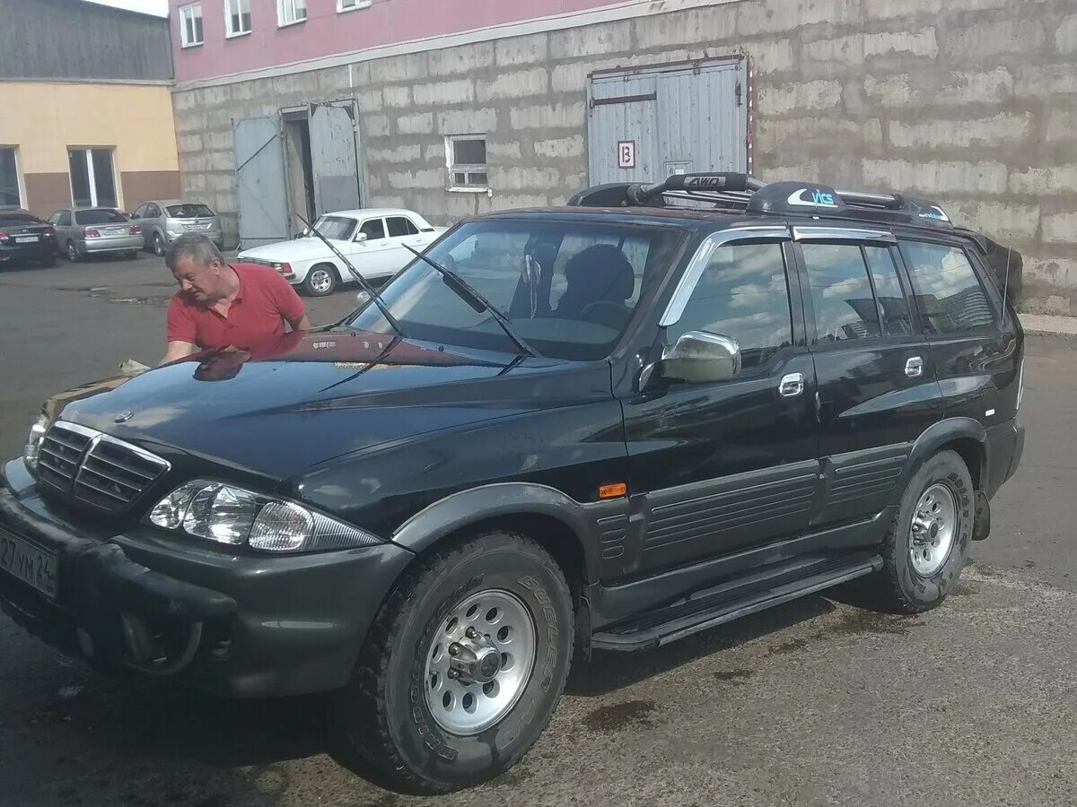 Санг енг муссо дизель. SSANGYONG Musso 2002. Санг енг Муссо 2002. ССАНГЙОНГ черный 2002 Муссо. Саньенг Муссо 2002 года дизель.