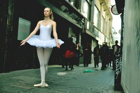 The ballerinas are under the shelf