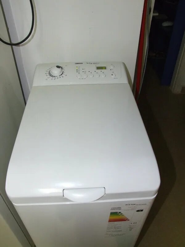 Купить занусси стиральную вертикальная загрузка. Занусси ZWQ 5100. Zanussi ZWQ 5100. Занусси стиральная машина вертикальная 5100. Zanussi стиральная машина с вертикальной загрузкой ZWQ 5100.