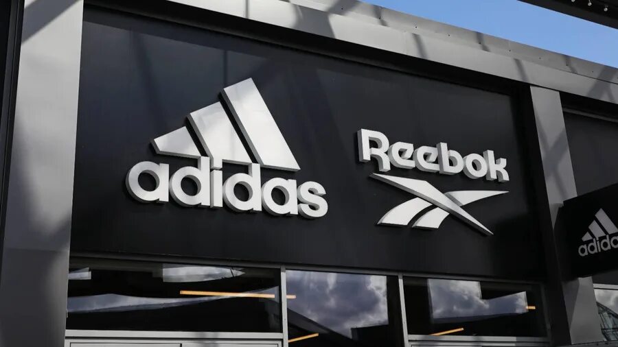 Немецкий концерн адидас. Adidas Reebok. Адидас рибок бренд. Фирма адидас Германия. Adidas company