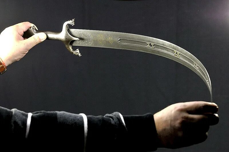 Тальвар индийская сабля. Индийский меч Тальвар. Патисса меч. Историческое Холодное оружие. Холодное оружие песня
