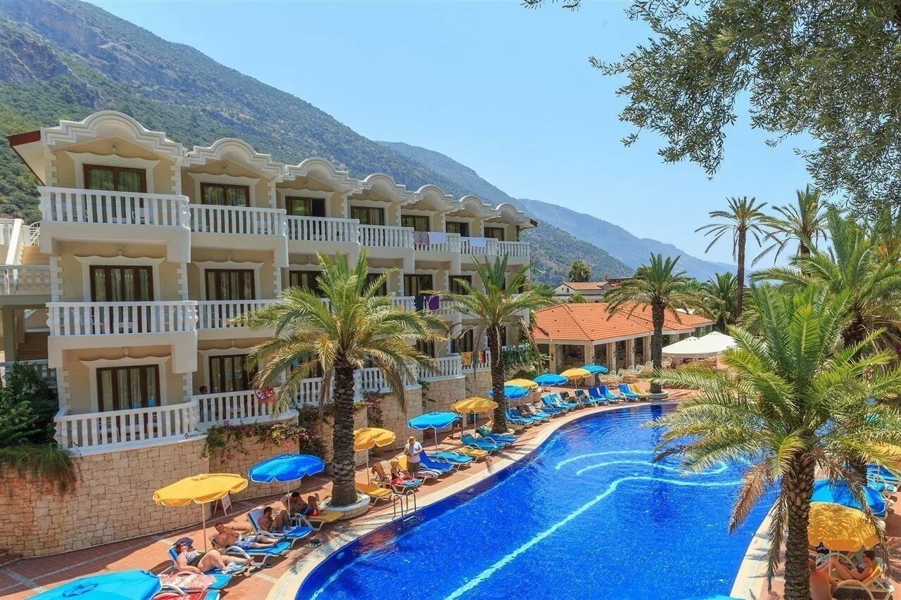 Flamingo hotel oludeniz. Flamingo Hotel Spa Олюдениз. Отель Фламинго Мармарис Турция. Фламинго отель Олюдениз 4. Отель Flamingo Hotel Oludeniz Турция.