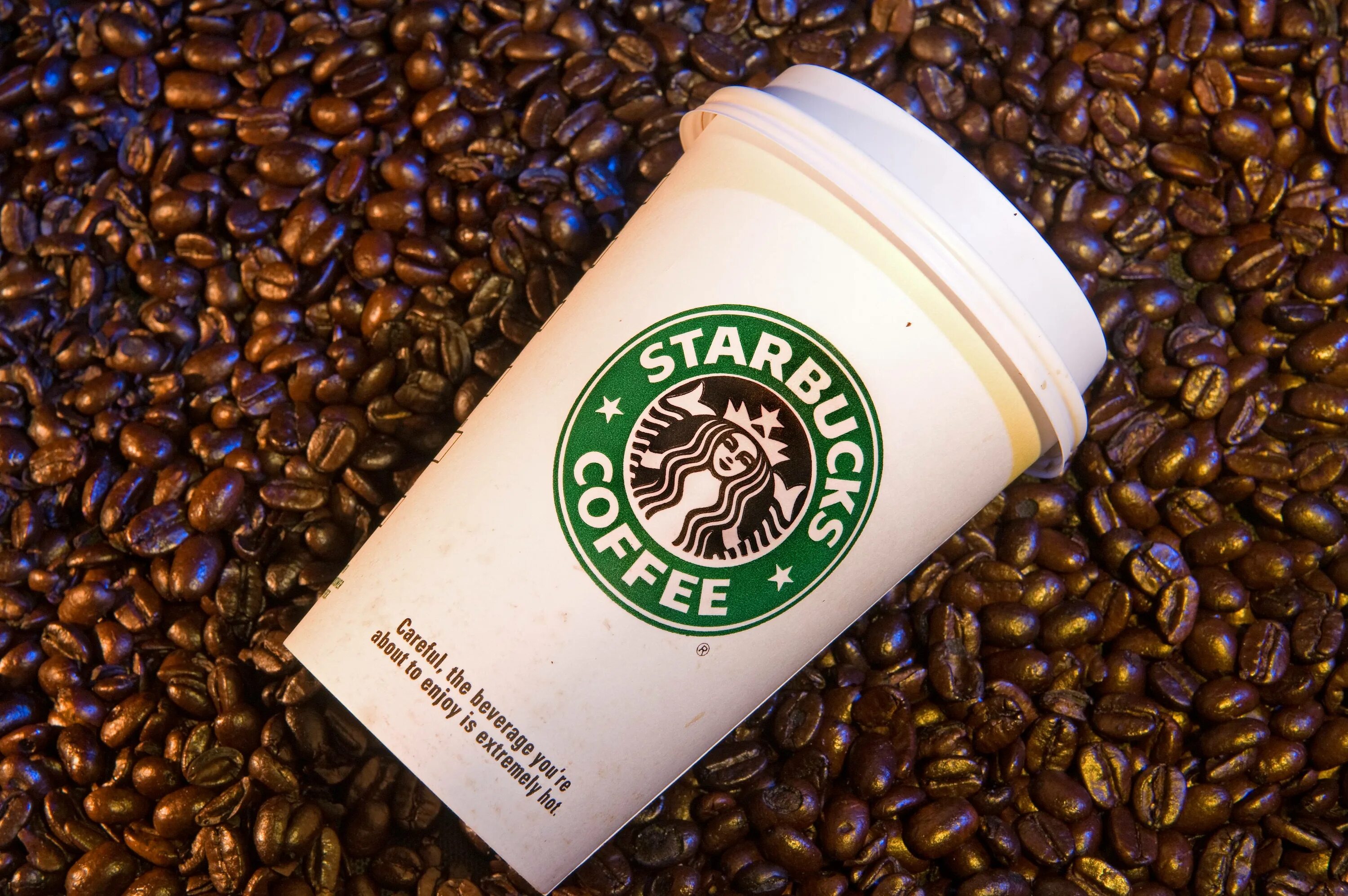 Кофейные фирмы. Coffee Старбакс. Старбакс кафе. Старбакс кофе в Америке. Кофе фирма Старбакс.