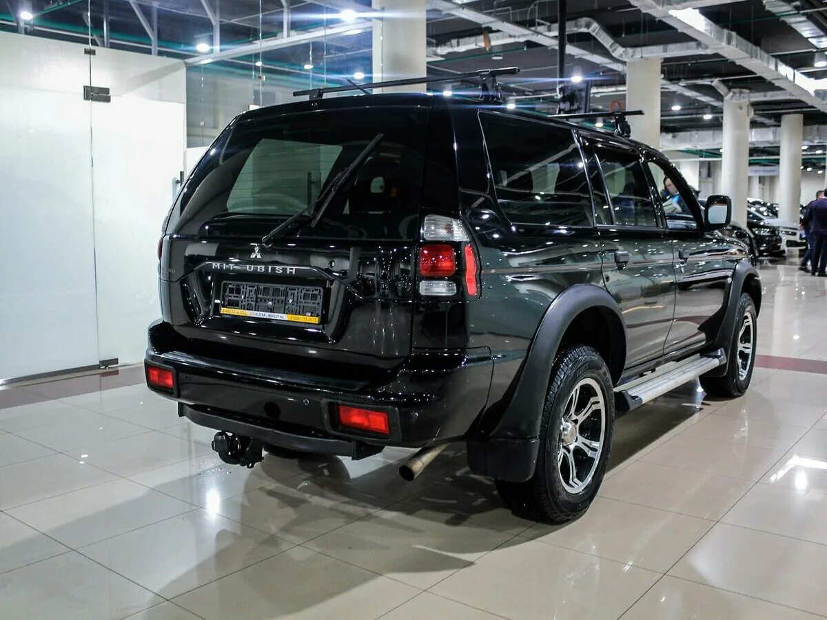 Мицубиси паджеро года выпуска. Mitsubishi Pajero Sport 2008. Mitsubishi Pajero Sport 4. Митсубиси Паджеро спорт 2008 года. Mitsubishi Pajero Sport 1 поколения.