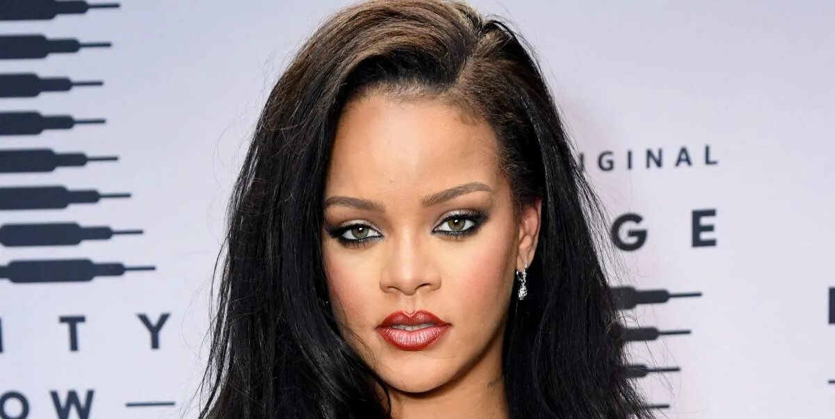 Rihanna Watches Chris Brown Play Basketball in Courtside Seats Rihanna sits in c