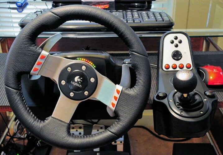 Logitech g27. Руль Logitech g27. Logitech g27 Racing Wheel. Игровой руль Logitech g25. Какой руль взять