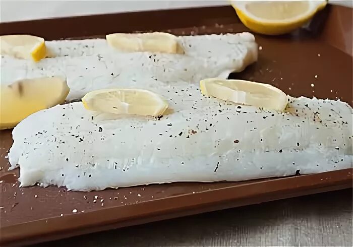 Палтус рецепт быстро и вкусно. Филе замороженного палтуса как приготовить. как нарезать филе палтуса на пирог. филе палтуса замороженное в брикетах как приготовить.