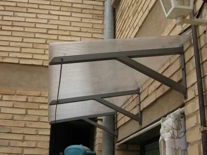 Примыкание навеса к стене дома
