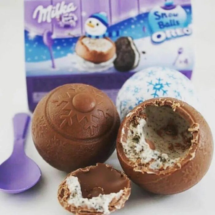Яйцо милка с начинкой. Шоколадные шарики milka snowballs. шоколадные яйца милка с орео. шоколадные конфеты milka яиц]. конфеты милка орео.