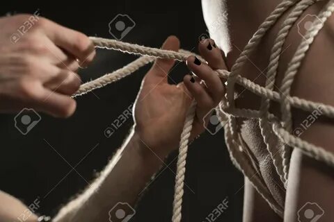 Woman Body Tied Up With Rope Cropped View Stock Photo, Picture And Royalty ...