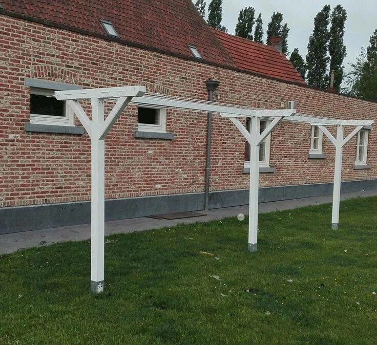 Сушилка для белья на даче. Сушилка brabantia wallfix. Сушка на улице. Сушилка для белья. Сушилка для белья во дворе.