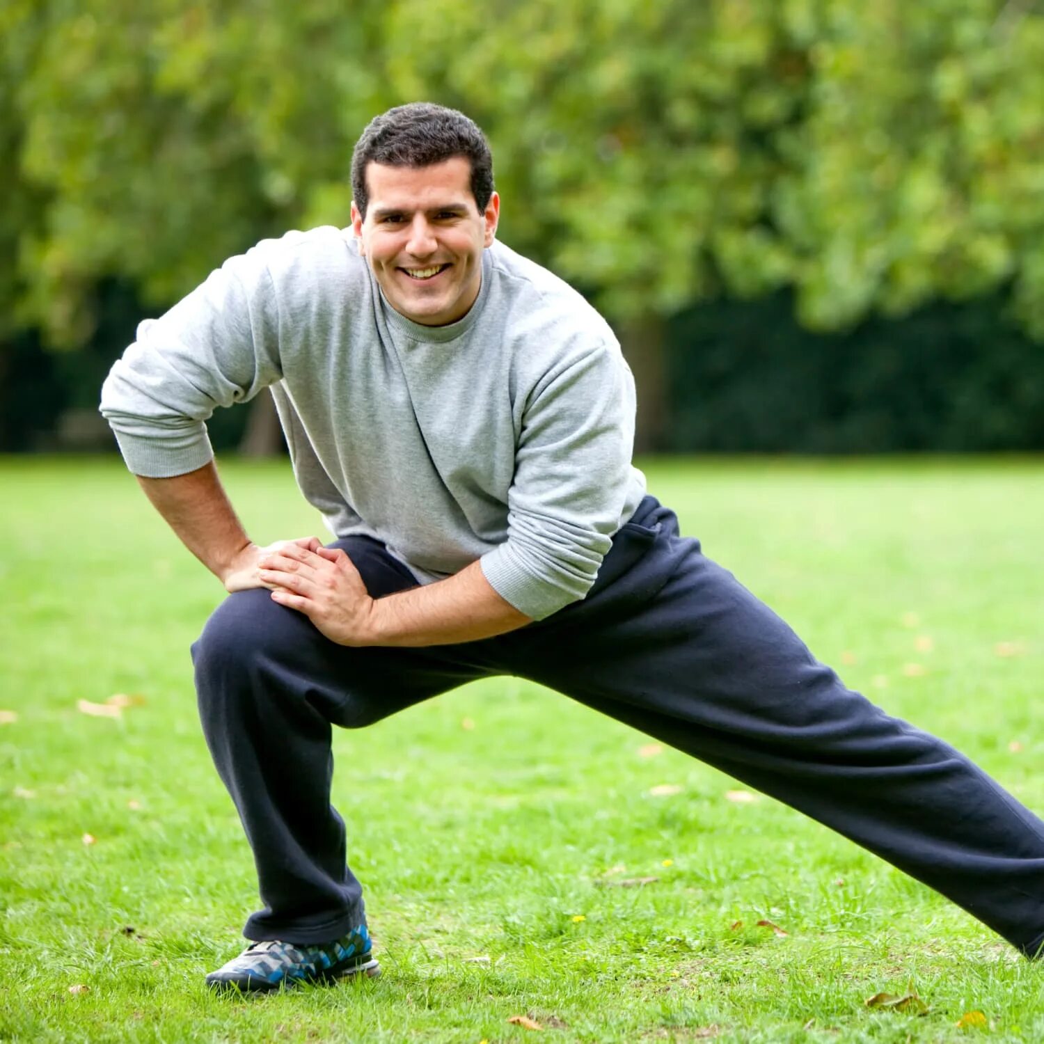 Stretch men. ورزش۳. Stretching man. Man stretches his hand up.