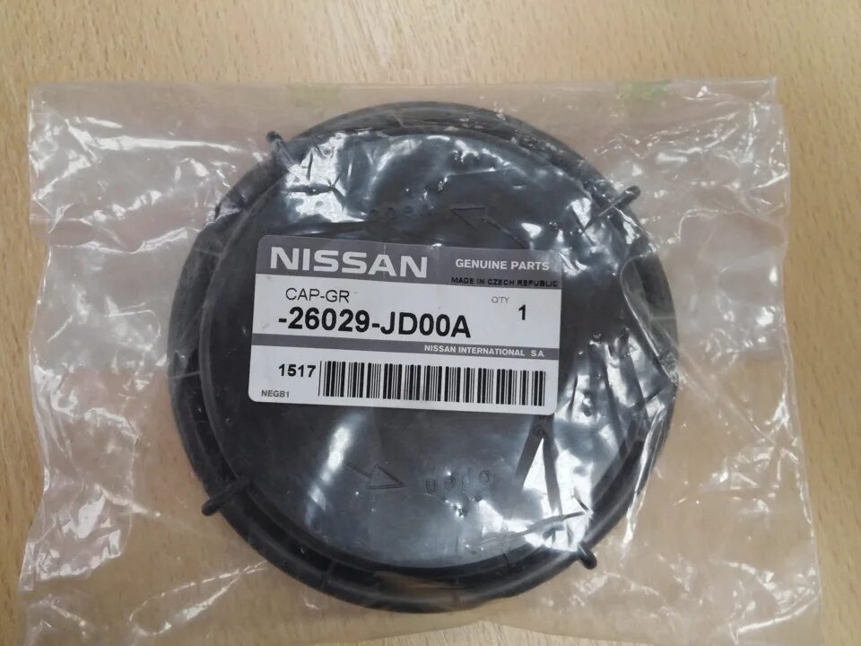 Заглушка ниссан икстрейл. Nissan 26029jd00a. Крышка фары 26029jd00a Nissan. Крышка фары Nissan Qashqai. Крышка фары Кашкай j10 артикул.