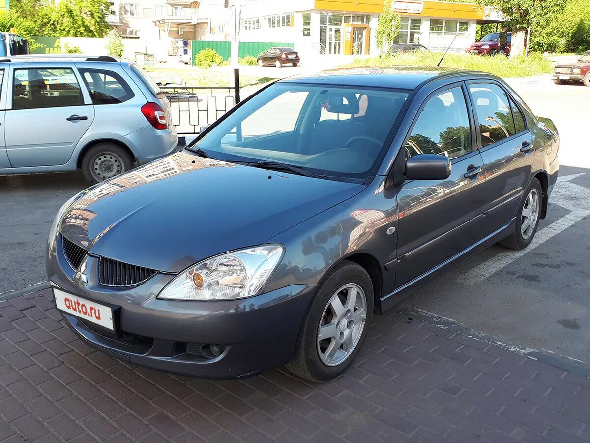 Mitsubishi Lancer 2005. Мицубиси Лансер 2005. Мицубиси ланцер 2005. Митсубиси Лансер 2005г. И 2006 г 2005 год