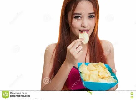 Beautiful Asian Healthy Girl Eat Potato Chips. 