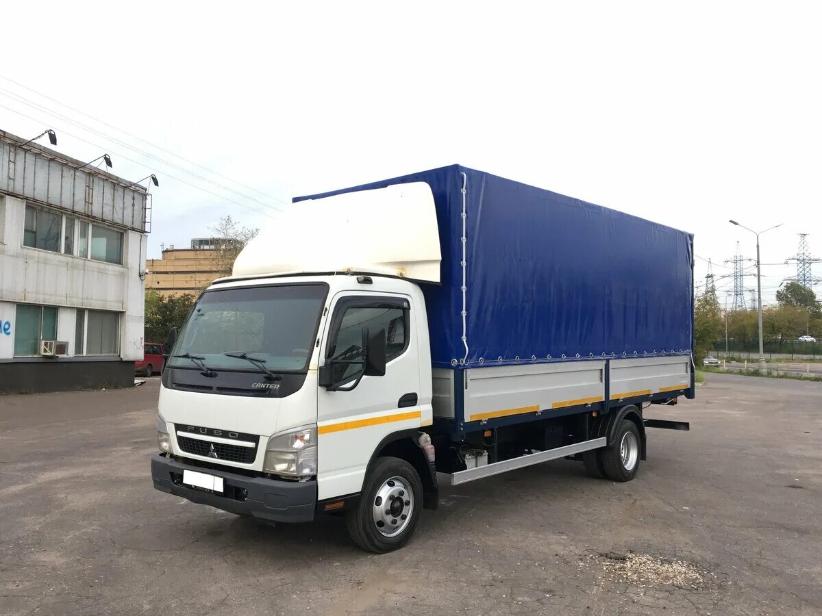 Купить фусо 5 тонн. Mitsubishi Fuso Canter 2012. Mitsubishi Fuso Canter фургон 5т. Фусо Кантер 5 тонн. Митсубиси Фуко Кантер 5 тон тентованый.