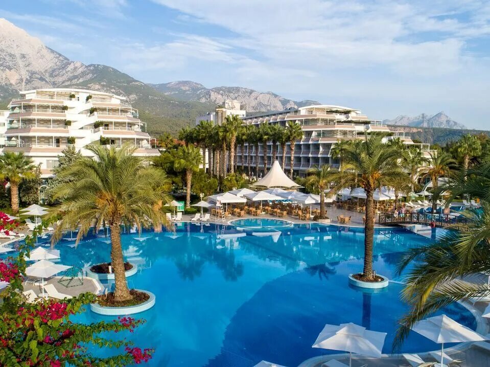 Queens park rai premium tekirova. квинс парк текирова кемер. Rai premium tekirova ex queens park 5. Rai premium tekirova 5 турция. отель квинс парк.