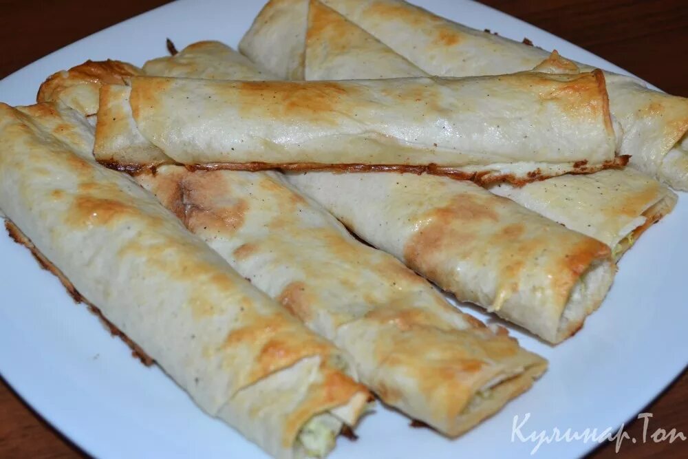 запеканка из лаваша с капустой. конвертики из лаваша с капустой и яйцом. капустный рулет из лаваша. пирожки с капустой из лаваша. пирожки с капустой и яйцом из лаваша.