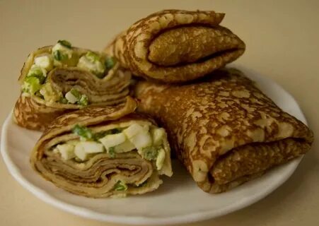 Фаршированные блины с яйцом и луком