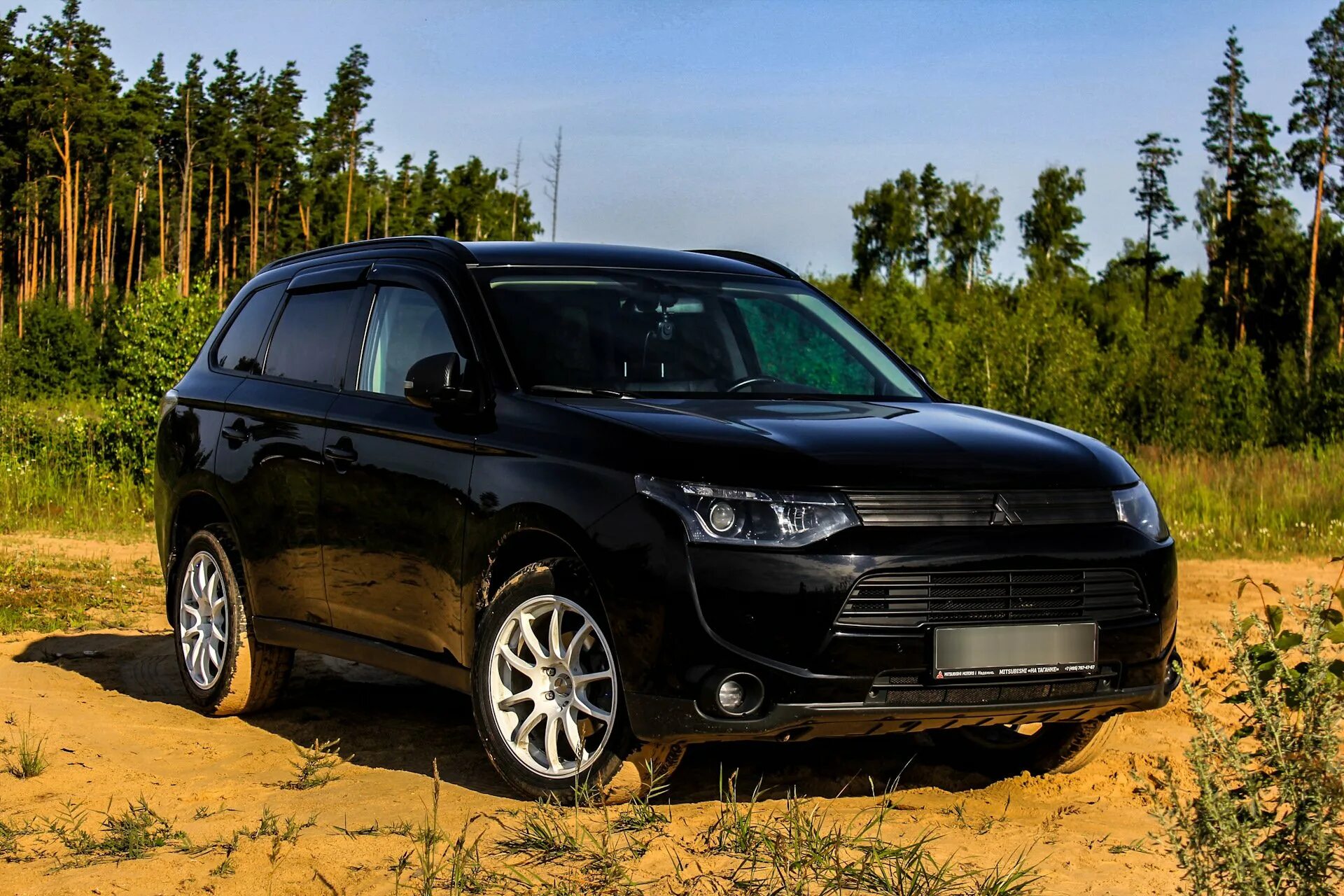 Mitsubishi outlander отзывы владельцев. Mitsubishi Outlander 2014 Black. Мицубиси Аутлендер 3. Mitsubishi Outlander 2013 черный. Mitsubishi Outlander 2017 черный.