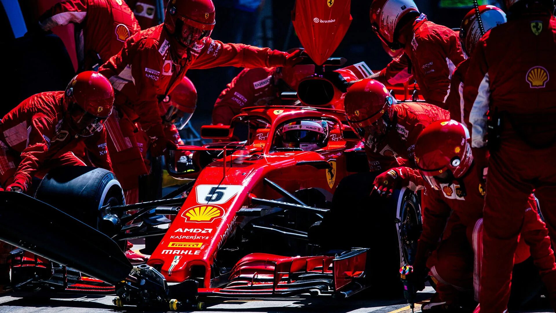 Гонщики саундтреки. Ferrari f1 Sebastian Vettel Bolide. Ferrari f1 пит стоп. Sebastian Vettel 2018. Ferrari f1 Sebastian Vettel poster.