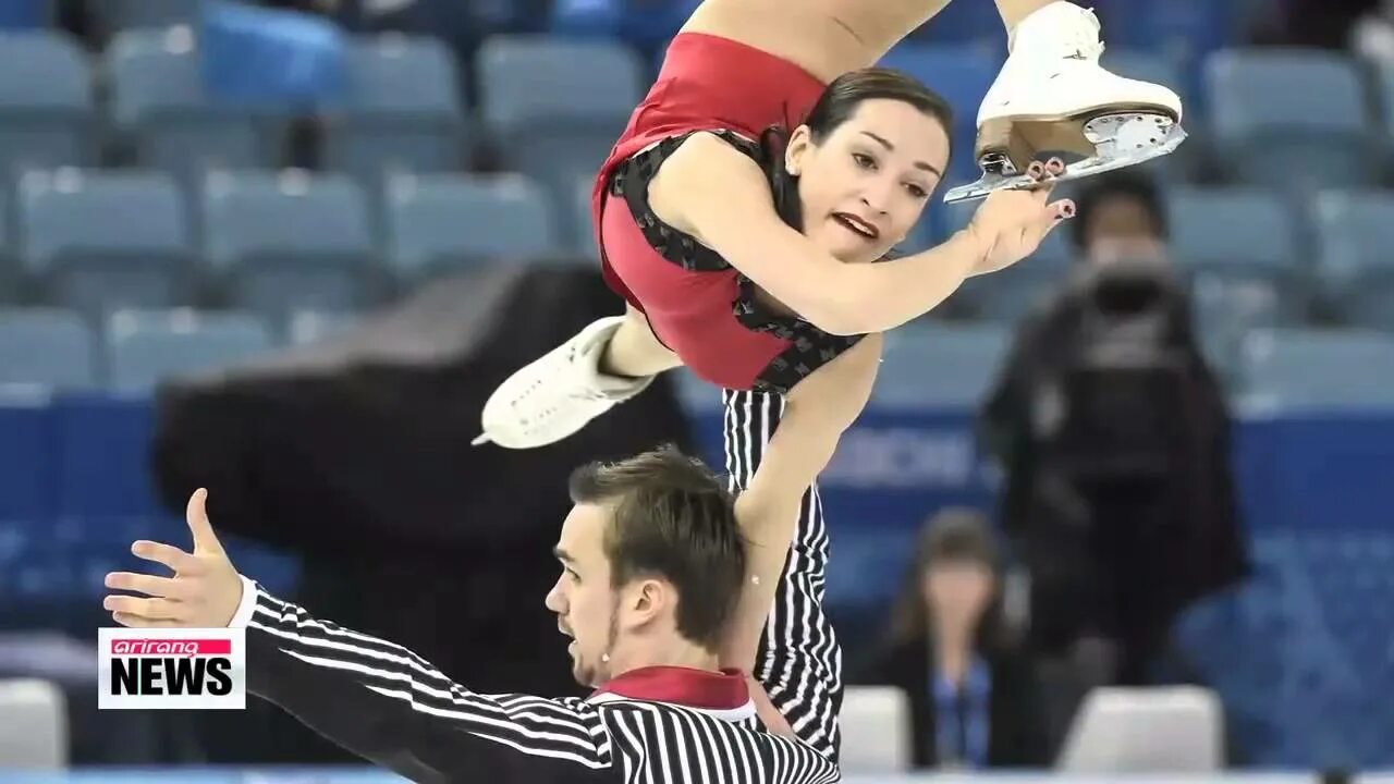 Russian Figure Skaters Embrace After Competition