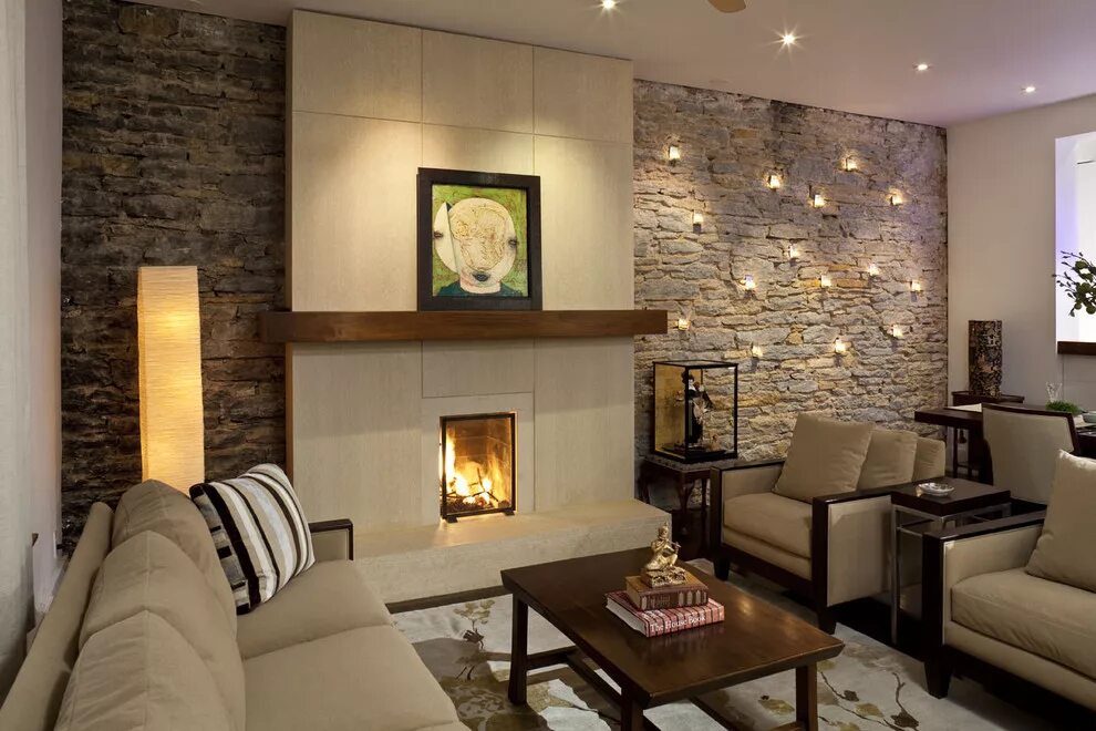 Contemporary living room with stacked stone accent wall, recess lighting and . C