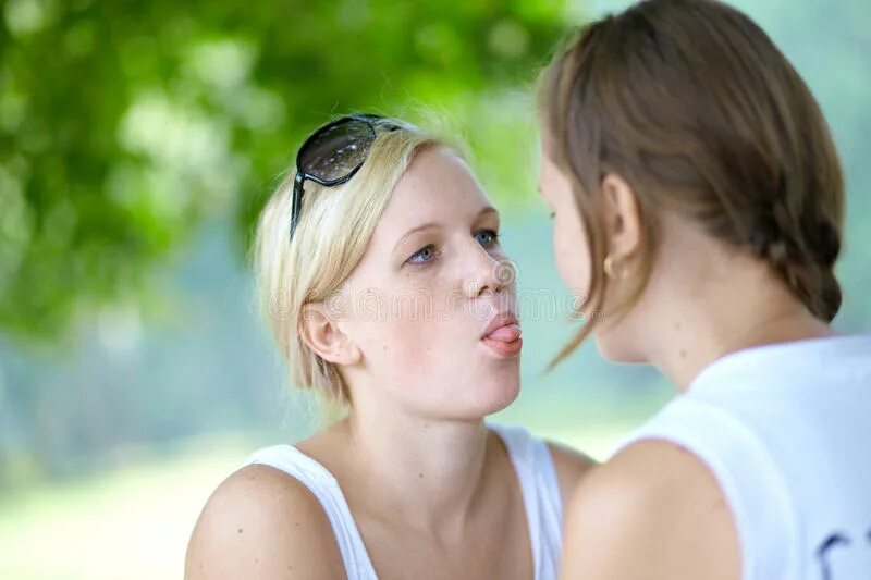 Looking at each other. Две девочки смотрят друг на друга. Look at each other.