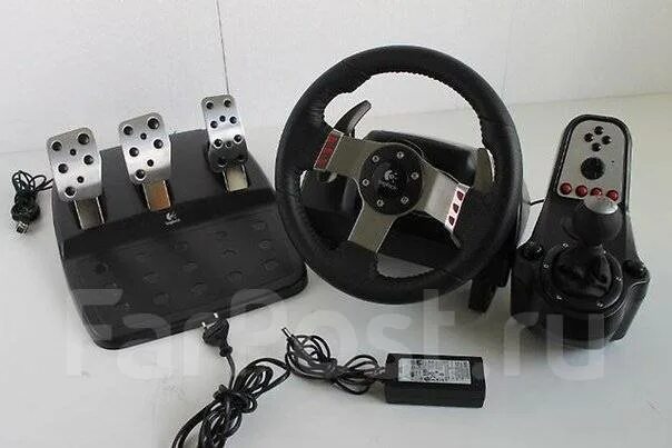 Wheel logitech g27. Руль Logitech g27. Игровой руль Logitech g27. Руль с педалями Logitech g27. Руль g27 Racing Wheel комплектация.
