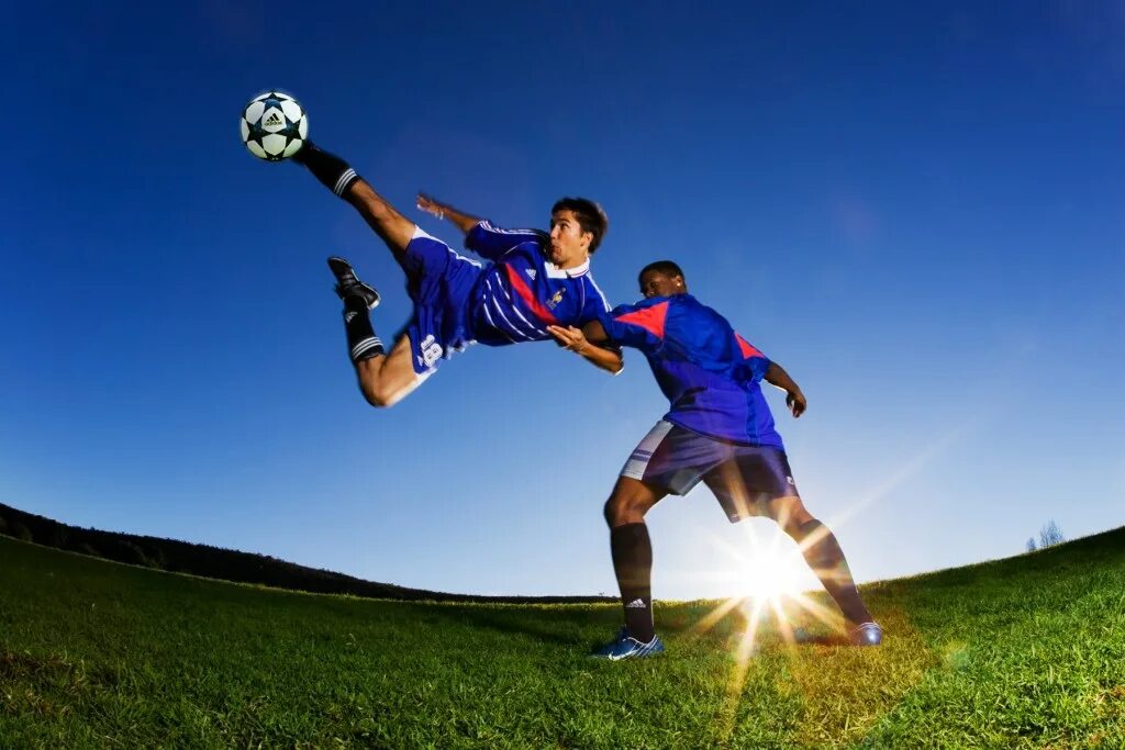 Football is a team game. Фото футболистов на поле. Фотограф фотографирует футболиста на поле. Вперёд ИТ футболисты. Фото футболистов на доску.