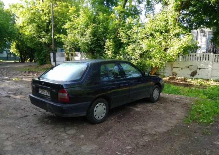 Ниссан санни 1993. Nissan Sunny n14. Ниссан Санни n14 лифтбек. Ниссан Санни 1993 года.