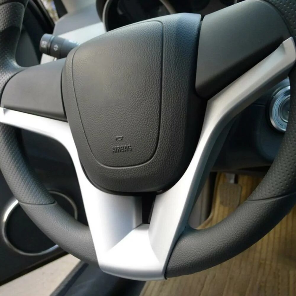 Чехол на руль шевроле круз 2013. Chevrolet cruze aveo orlando руль. Накладка на руль шевроле круз. Накладка на руль шевроле. Руль шевроле круз 2010.